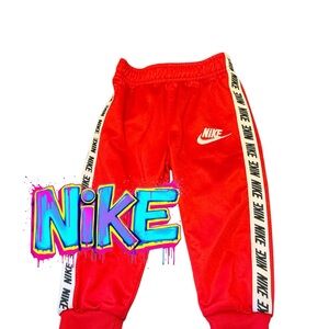 Nike Kids Red Sweatpants with Logo Stripes